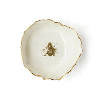 The Voyage Dubai - HB Ceramics Jagged Bowl Bee - Handmade in a small studio in Notting Hill by Heidi Bishop, this stunning porcelain 'jagged' bowl features delicate hand painted bee and is finished with gold edging.