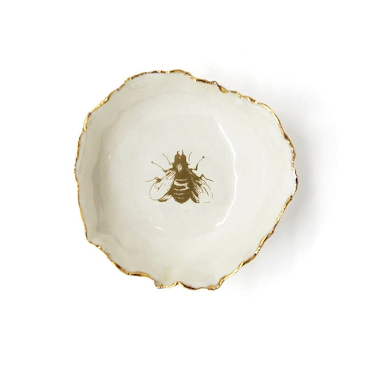 The Voyage Dubai - HB Ceramics Jagged Bowl Bee - Handmade in a small studio in Notting Hill by Heidi Bishop, this stunning porcelain 'jagged' bowl features delicate hand painted bee and is finished with gold edging.