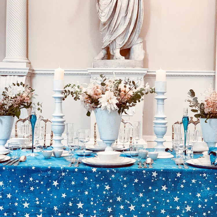 The Voyage Dubai - S&B Celestial Stars Linen Tablecloth in Blue
This beautiful bright blue 100% linen tablecloth depicts the night sky, dappled with bright white twinkling stars.