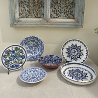 The Voyage Dubai - One of a kind, hand-painted Iznik ceramic dish from Turkey featuring a bold blue and white geometric design.