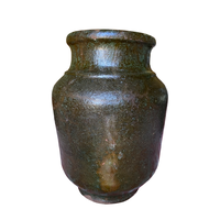 The Voyage Dubai - Vintage earthenware vase finished in a deep green glaze. The vase shows signs of age with a beautiful patina that adds to its charm and character.