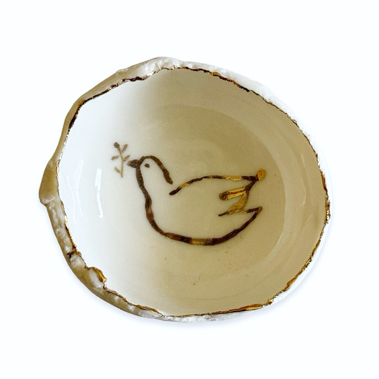 The Voyage Dubai - HB Ceramics Jagged Bowl Dove - Handmade in a small studio in Notting Hill by Heidi Bishop, this stunning porcelain 'jagged' bowl features delicate hand painted dove and is finished with gold edging.