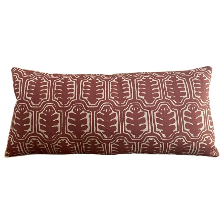 The Voyage Dubai - A striking accent cushion crafted from Volga Linen's Inuit print in rust finished with cream piping and concealed zip.