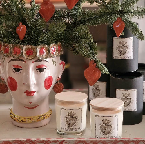 The Voyage Dubai - The Exvotos Scented Candle   "SMELL OF HOLINESS" is a new project by The Exvotos focused on creating sensations through the sense of smell. For this first edition Luciano and Daniel turned to Saint Anthony of Padua for inspiration.