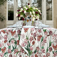 Tablecloth in Red & Pink
Tulipmania takes hold all over again… With rich, complex colours and elaborately curved and crimped petals that give each flower a distinctive character, this tablecloth explores the intriguing nature of the Tulip, a flower that has continued to beguile with its beauty,throughout the centuries.