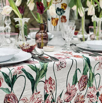 Tablecloth in Red & Pink
Tulipmania takes hold all over again… With rich, complex colours and elaborately curved and crimped petals that give each flower a distinctive character, this tablecloth explores the intriguing nature of the Tulip, a flower that has continued to beguile with its beauty,throughout the centuries.