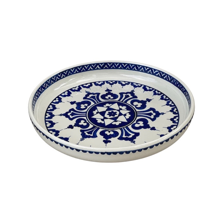 The Voyage Dubai - One of a kind, hand-painted Iznik ceramic dish from Turkey featuring a bold blue and white geometric design.