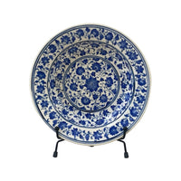 The Voyage Dubai - A set of beautiful hand-painted Iznik ceramic plates from Turkey.  The trio of plates, featuring intricate floral designs in a classic blue and white palette, make a stunning addition to any home.
