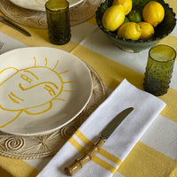 The Voyage Dubai - Lunch in Tangier Thick Stripe Tablecloth - Buttercup Made from a wonderfully soft yet highly durable handwoven cotton, the Lunch in Tangier tablecloth is perfect for everyday use and equally stunning dressed up for a special occasion.