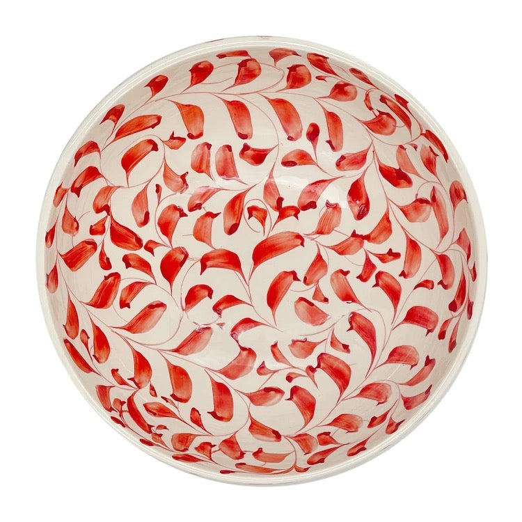 The Voyage Dubai - Scroll Bowl, 22cm in Red   One of Villa Bologna's heritage designs, the Scroll is instantly recognisable in Malta having been in production since the 1950’s. Conceived by Aldo Cremona and passed down over the years, it is a romantic pattern that is full of vibrancy thanks to the sunny colourways and busy rhythm. Pair with the Stripe collection for a laid-back mix-and-match look.  Handmade and hand painted made in Malta.