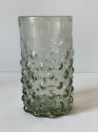 The Voyage Dubai - Handblown Syrian Recycled Bubble Tumbler (Clear)  Beautiful, whilst adding an element of fun, coloured glass is having a moment in the spotlight and we absolutely love these bubble tumblers, individually hand-crafted by talented artisans in Syria.