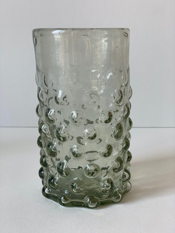 The Voyage Dubai - Handblown Syrian Recycled Bubble Tumbler (Clear)  Beautiful, whilst adding an element of fun, coloured glass is having a moment in the spotlight and we absolutely love these bubble tumblers, individually hand-crafted by talented artisans in Syria.