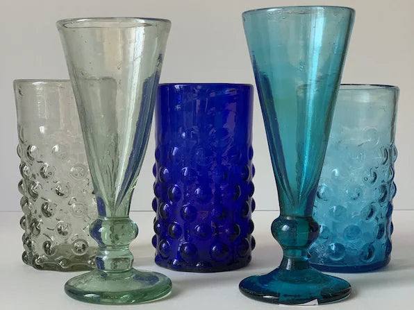 Salaheddin glassware is mouth-blown from recycled glass in the Syrian tradition of Damascus and Aleppo. Individually made, each piece unique, at The Voyage Dubai.
