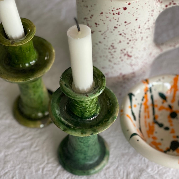 The Voyage Dubai - Perfectly imperfect, Tamegroute pottery is seriously beautiful with all its lumps, bumps and imperfections. Available as bowls and candlestick holders in the most stunning wood-fired glaze in gorgeous shades of green.