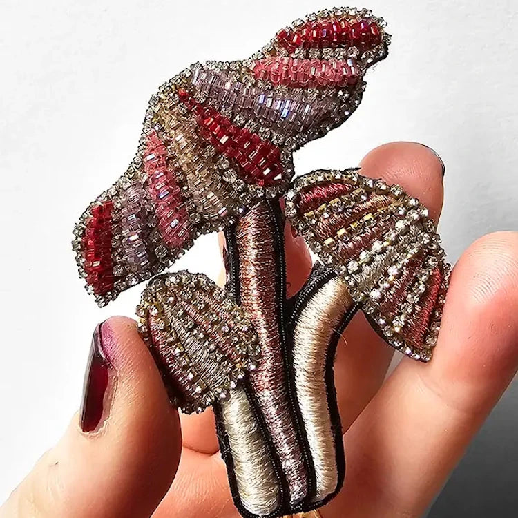 Hand embroidered brooch by French label Céleste Mogador.