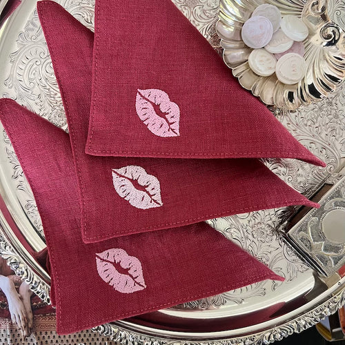 The Voyage DubaiBisous Cocktail Napkins in Raspberry   A chic set of cocktail napkins to elevate cocktail hour. Great for any occasion, perfect for Valentine's Day or a girls' night in!  Our cocktail napkins are handcrafted from 100% European linen that has been stonewashed and softened giving them a wonderful, luxurious feel. The cocktail napkins come beautifully presented making for the perfect gift.