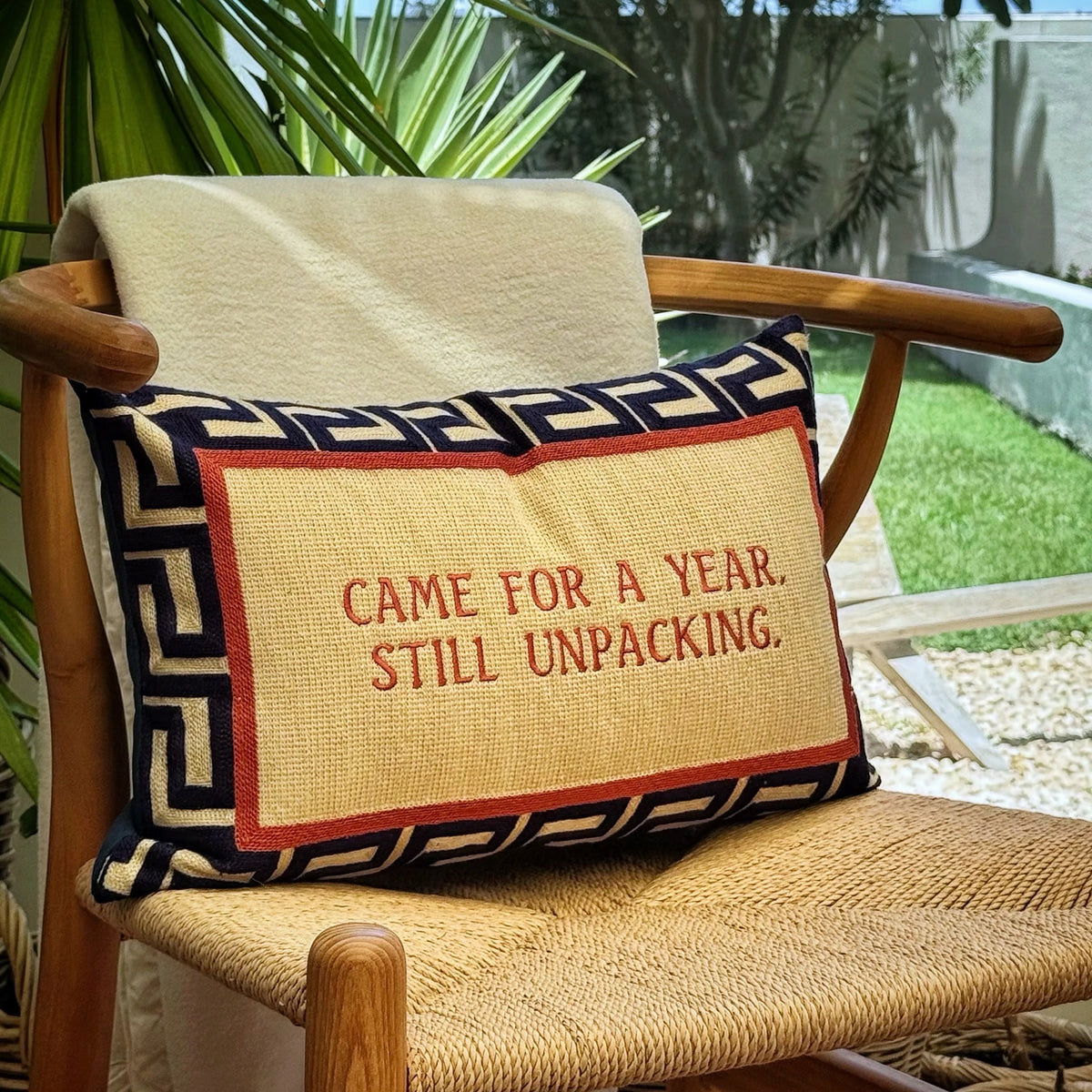 The Voyage Dubai - Came for a Year. Still Unpacking. Needlepoint Cushion