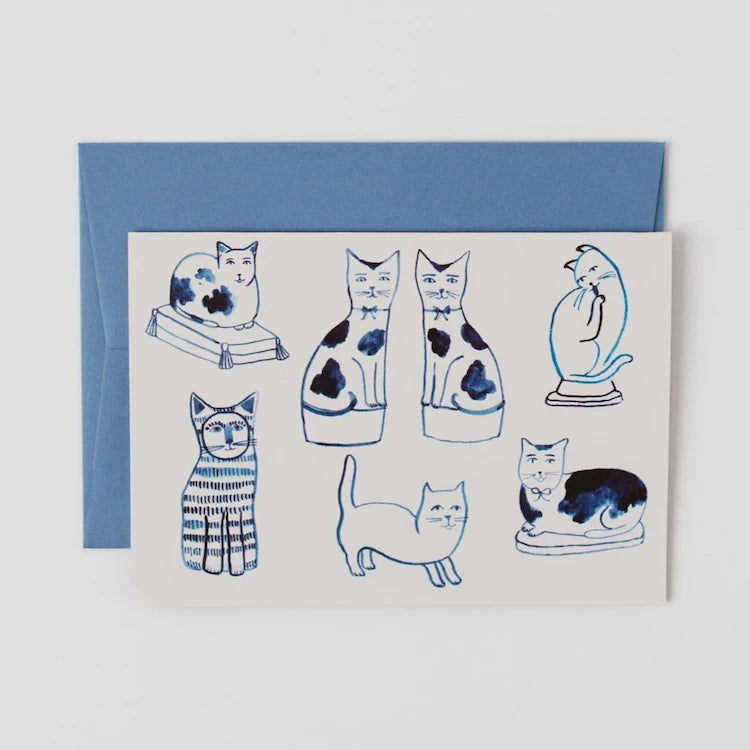 A playful cat greeting card is inspired by the charming ceramic cats found in some of Kate's favourite museums.