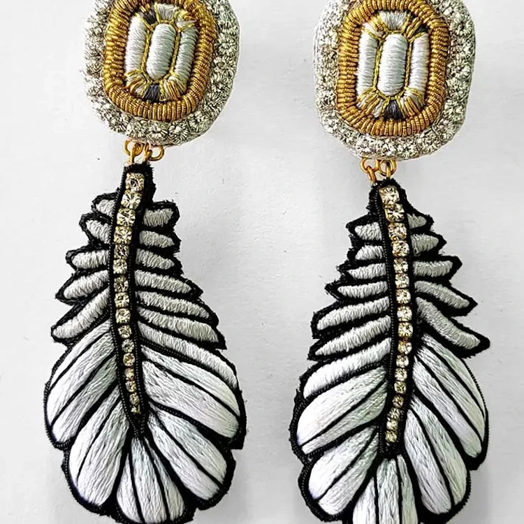Hand embroidered earrings by French label Céleste Mogador.