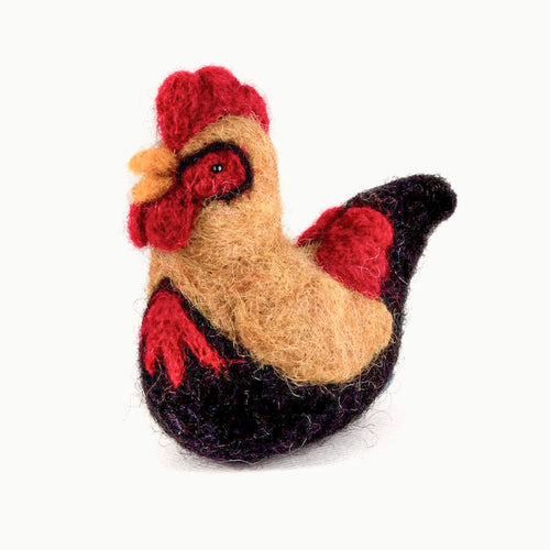 The Voyage Dubai - Felted Wool Rooster This colourful felted wool rooster is a perfect addition to your Spring or Easter decorations. Mix with our other felted barnyard animals for the full look. Handmade by Mayan Hands artisan partners in the Guatemalan highlands.