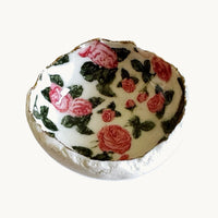 Handmade in a small studio in Notting Hill by Heidi Bishop, this stunning porcelain 'jagged' bowl features&nbsp;delicate hand painted roses and is finished with gold edging.