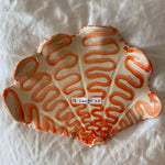 The Voyage Dubai - Shellegance - Hand-made and decorated ceramic shells from South African artist Lucie de Moyencourt. Each shell is completely unique and one of a kind.