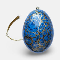 The Voyage Dubai - These decorative Easter eggs are handcrafted and painted by skilled artisans in beautiful kashmiri designs.  Made from willow wood and paper mache and individually painted in an assortment of rich, vibrant colours, they come ready with string for hanging and are finished with a gold tassel adding the final touch.  The perfect addition to your Easter tree or table. 