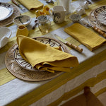 The Voyage Dubai - Broad Stripe Linen Tablecloth in Chinese Yellow/Natural  This beautiful broad stripe linen tablecloth from luxury British fabric house Volga Linen mixes stripes in herringbone and plain weaves and has a top stitch detail that brings definition to the design.  Colour: Chinese Yellow/Natural   Composition: 100% linen