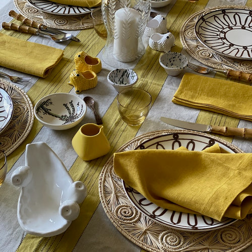 The Voyage Dubai - Broad Stripe Linen Tablecloth in Chinese Yellow/Natural  This beautiful broad stripe linen tablecloth from luxury British fabric house Volga Linen mixes stripes in herringbone and plain weaves and has a top stitch detail that brings definition to the design.  Colour: Chinese Yellow/Natural   Composition: 100% linen