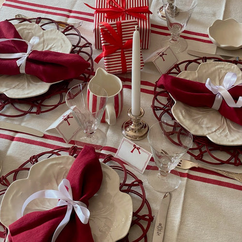 The Voyage Dubai - Lunch in Tangier Tablecloth - Red and White Stripe Tablecloth Made from a wonderfully soft yet highly durable handwoven cotton, the Lunch in Tangier tablecloth is perfect for everyday use and equally stunning dressed up for a special occasion. A truly versatile piece that will have you reaching for it time and time again.