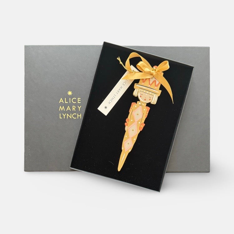 The Voyage Dubai - Cracker Girl in Ochre Hand Painted Wooden Ornament by Alice Mary Lynch