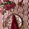 The Voyage Dubai - Mallorcan Ikat Tablecloth in Raspberry Ribbon. A striking cotton blend tablecloth printed in this traditional geometric motif reflective of the easy Mediterranean lifestyle. Perfect for long lunches and alfresco dining.