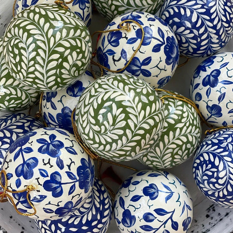 The Voyage Dubai - Papier-mâché hand painted Christmas baubles from Kashmir, India. These decorative, lightweight baubles are handcrafted and hand painted by talented artisans in beautiful Kashmiri designs.