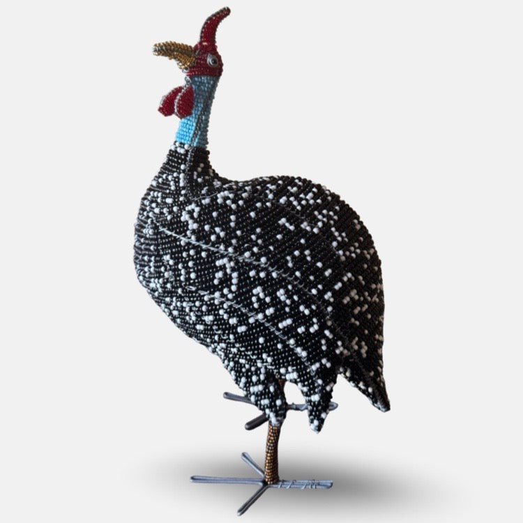 The Voyage Dubai - Hand-Beaded Guineafowl

Hand-beaded sculptures designed in Cape Town by Marguerite Mavros Macdonald and crafted by Zimbabwean artisans supported through Bros on the Road, a not-for-profit organisation founded in 2020.