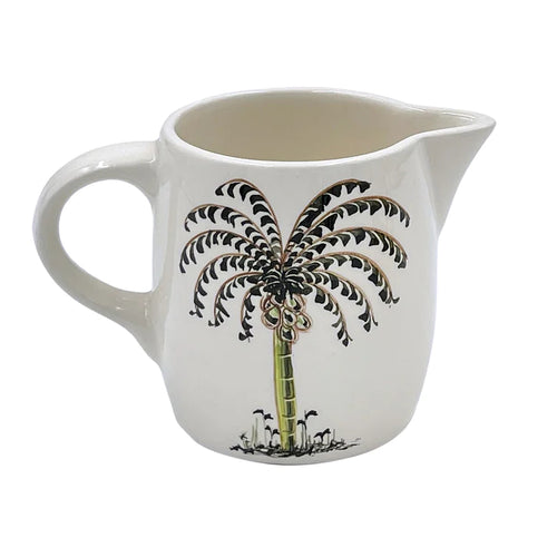 The Voyage Dubai - Milk Jug in Palm  A recent addition to the Villa Bologna Pottery family, the Palm collection is designed to evoke the sunny spirit of the Mediterranean, whose islands are dotted with them. Mix-and-match the Palm with other designs for an informal look.