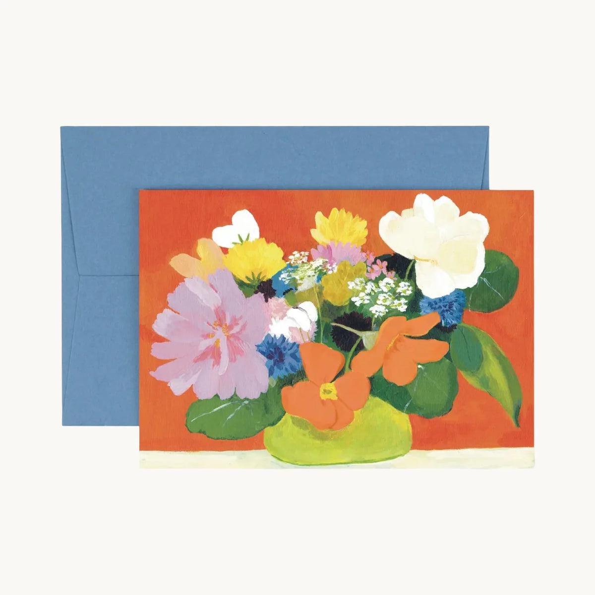 Landscape greeting card of a bright bouquet with orange nasturtiums, pink, white and blue flowers in a lime green vase on orange, with a blue envelope