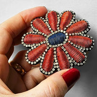 Hand embroidered brooch by French label Céleste Mogador.