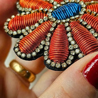 Hand embroidered brooch by French label Céleste Mogador.