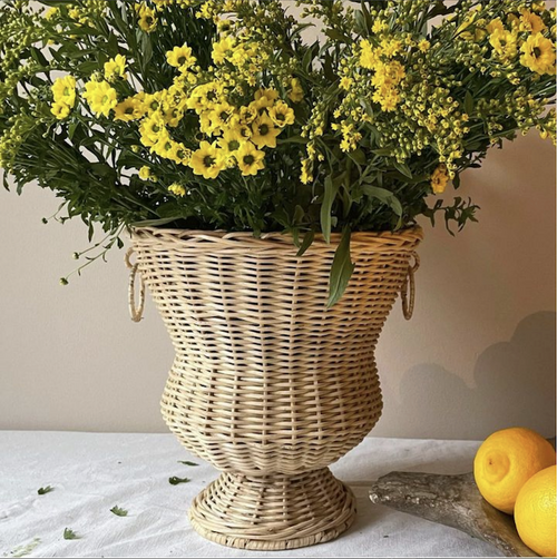 The Voyage Dubai - Handwoven Rattan Medici Vase designed by Mith.cph.  A beautifully crafted piece, made entirely by hand in Indonesia, inspired by the iconic Medici vase.   Use to display plants or flowers or simply as a statement piece in your home.  Origin – Indonesia  Material - Rattan  Approximate Dimensions: 37 cm H x  37 cm Diameter