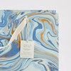 The Voyage Dubai - hand marbled gift bags are made from a strong 250gsm recycled cotton card paper in colours and designs complementing the gift wrap range. The bags are hand marbled by artisans using traditional techniques and are not digitally mass produced.