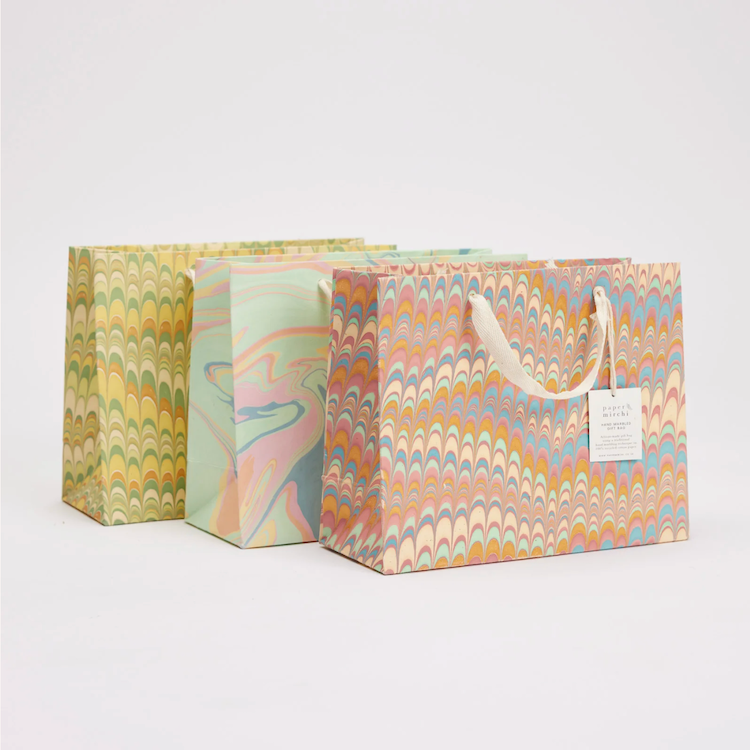 The Voyage Dubai - These hand marbled gift bags are made from a strong 250gsm recycled cotton card paper in colours and designs complementing the gift wrap range. The bags are hand marbled by artisans using traditional techniques and are not digitally mass produced.