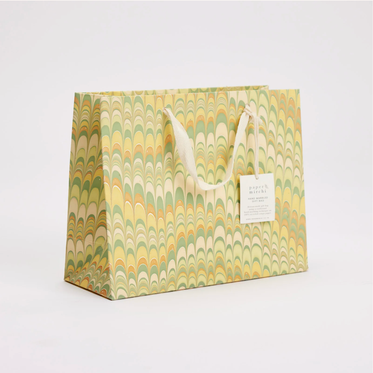 The Voyage Dubai - These hand marbled gift bags are made from a strong 250gsm recycled cotton card paper in colours and designs complementing the gift wrap range. The bags are hand marbled by artisans using traditional techniques and are not digitally mass produced.