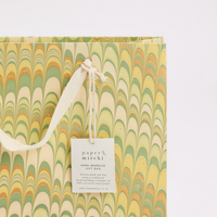 The Voyage Dubai - These hand marbled gift bags are made from a strong 250gsm recycled cotton card paper in colours and designs complementing the gift wrap range. The bags are hand marbled by artisans using traditional techniques and are not digitally mass produced.