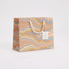 The Voyage Dubai - These hand marbled gift bags are made from a strong 250gsm recycled cotton card paper in colours and designs complementing the gift wrap range. The bags are hand marbled by artisans using traditional techniques and are not digitally mass produced.