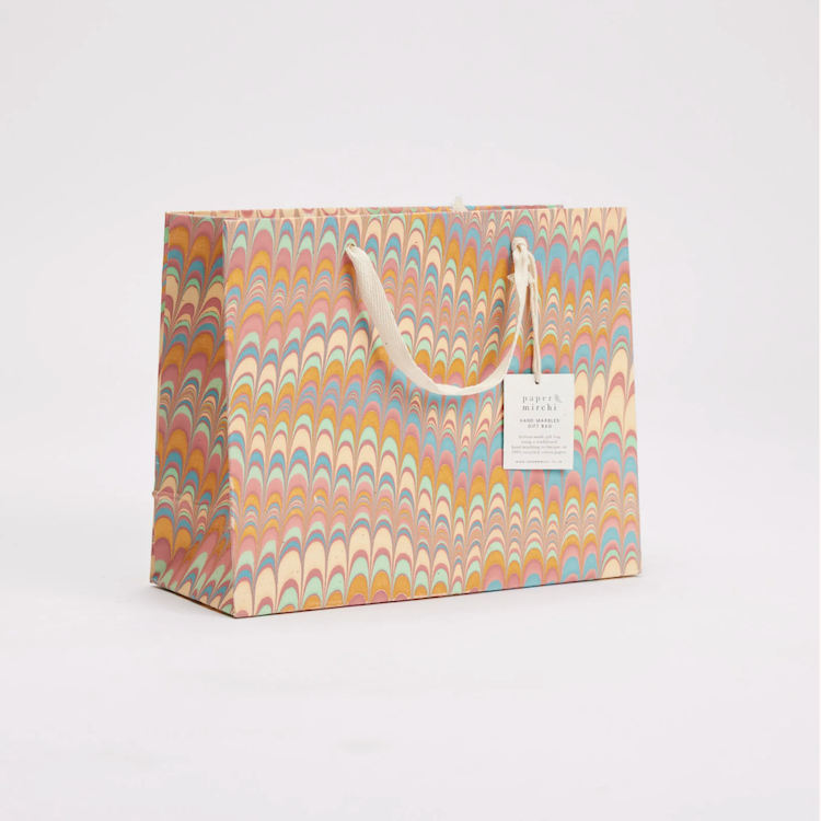 The Voyage Dubai - These hand marbled gift bags are made from a strong 250gsm recycled cotton card paper in colours and designs complementing the gift wrap range. The bags are hand marbled by artisans using traditional techniques and are not digitally mass produced.