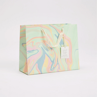 The Voyage Dubai - These hand marbled gift bags are made from a strong 250gsm recycled cotton card paper in colours and designs complementing the gift wrap range. The bags are hand marbled by artisans using traditional techniques and are not digitally mass produced.