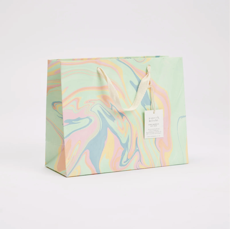 The Voyage Dubai - These hand marbled gift bags are made from a strong 250gsm recycled cotton card paper in colours and designs complementing the gift wrap range. The bags are hand marbled by artisans using traditional techniques and are not digitally mass produced.