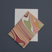 The Voyage Dubai - This boxed set of luxury notecards/envelopes is a stationery lover's dream. Each set features 6 beautiful, die-cut notecards and envelopes, handcrafted by artisans in India, using traditional techniques of wood block printing and hand marbling.