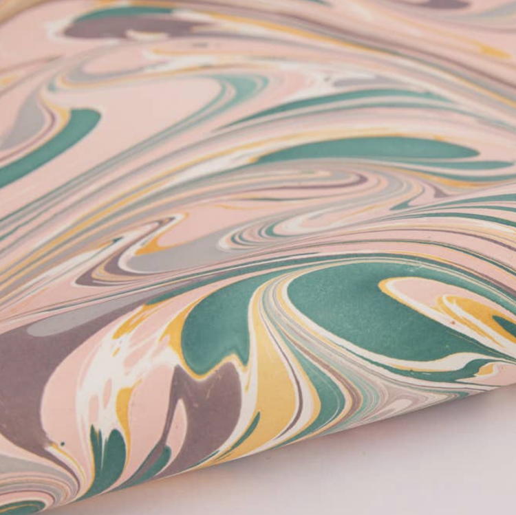 The Voyage Dubai - These paper sheets are each individually hand marbled by skilled artisans on to luxurious cotton handmade papers. They are not screen printed or digitally mass-produced.
The beautiful free-flowing hand marbled designs are suitable for any occasion and are also popular choice for art and craft, origami and bookbinding.