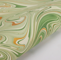 The Voyage Dubai - These paper sheets are each individually hand marbled by skilled artisans on to luxurious cotton handmade papers. They are not screen printed or digitally mass-produced.
The beautiful free-flowing hand marbled designs are suitable for any occasion and are also popular choice for art and craft, origami and bookbinding.